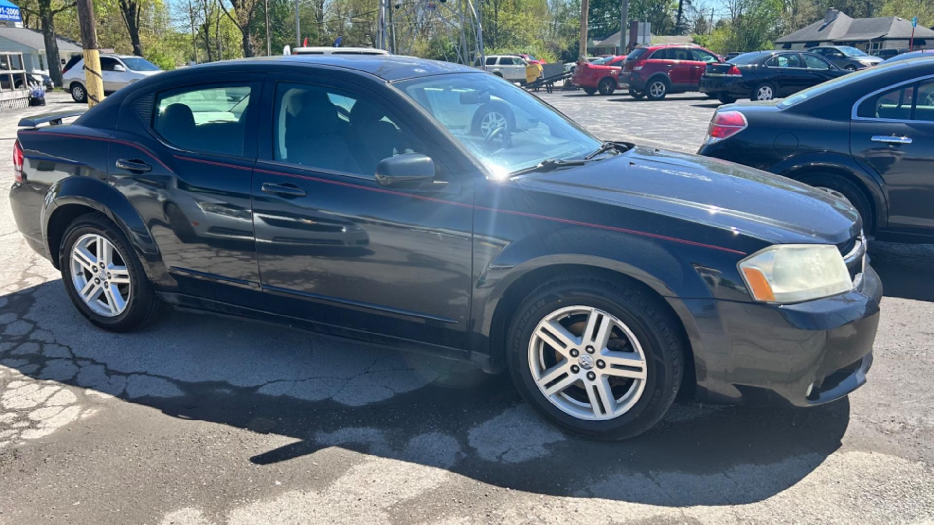 2009 Black Dodge Avenger SXT (1B3LC56B29N) with an 2.0L L4 DOHC 16V engine, 4-Speed Automatic Overdrive transmission, located at 2710A Westlane Rd., Indianapolis, IN, 46268, (317) 291-2000, 39.885670, -86.208160 - Photo#3